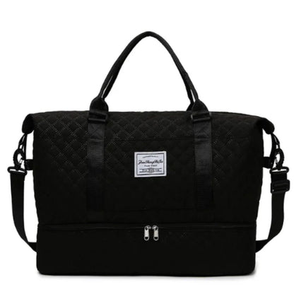 Quilted travel tote bag with shoe compartment