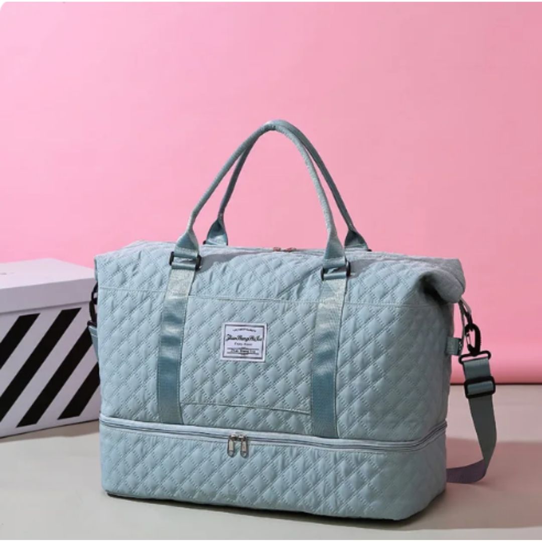 Quilted travel tote bag with shoe compartment