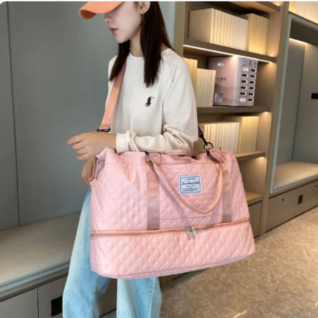 Quilted travel tote bag with shoe compartment