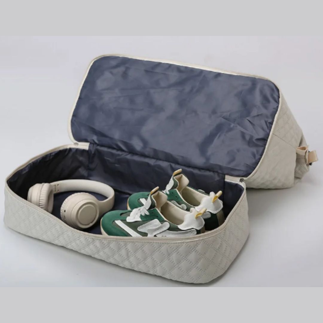 Quilted travel tote bag with shoe compartment
