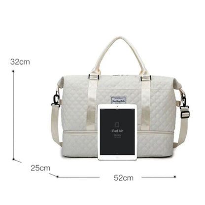 Quilted travel tote bag with shoe compartment